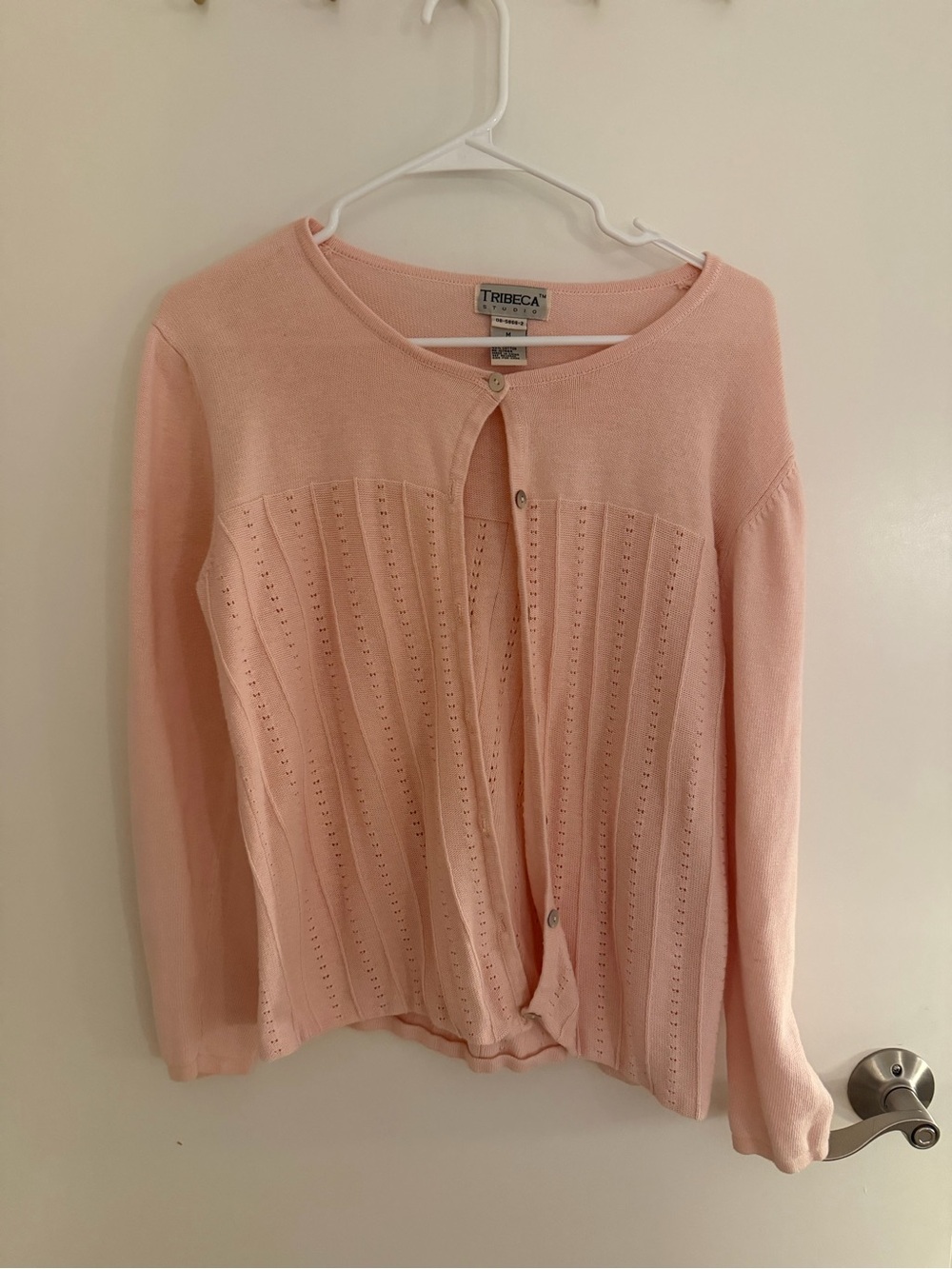 Women's Pink Eyelet Cardigan Sweater and tank top.